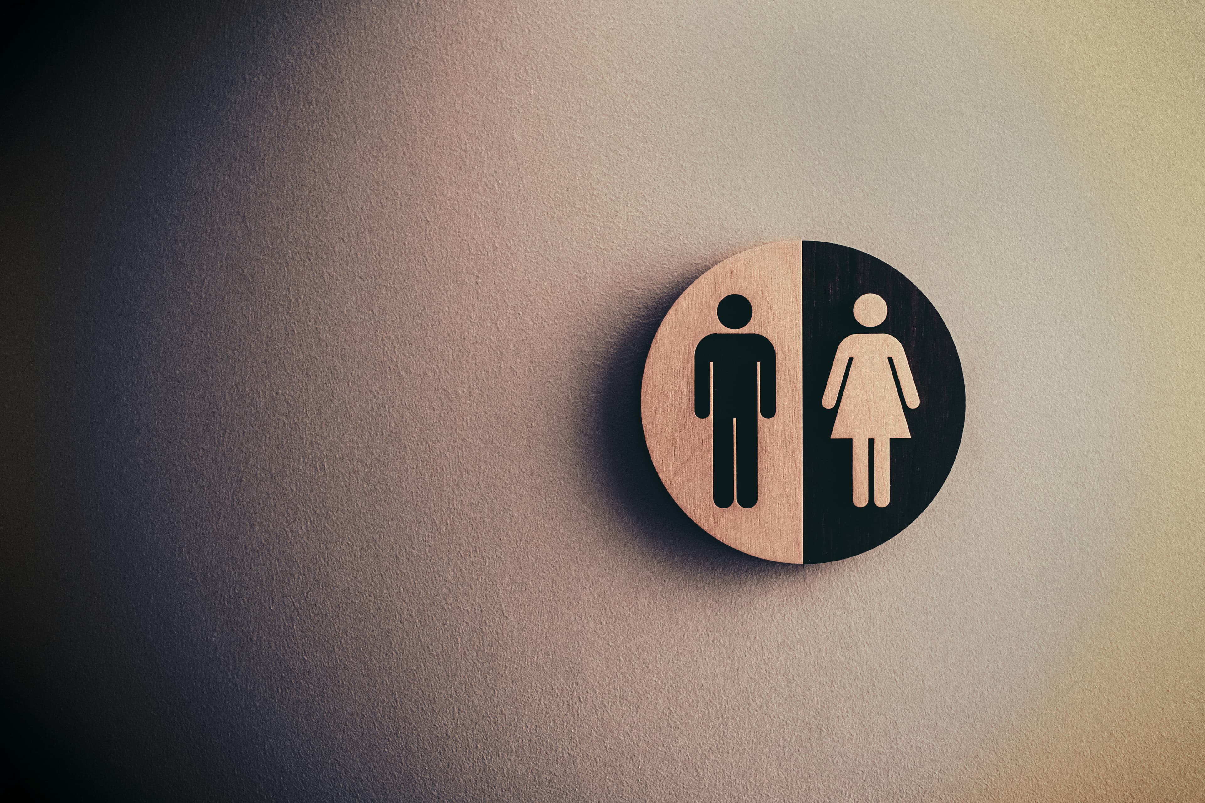 Male and female signage representing unisex concept